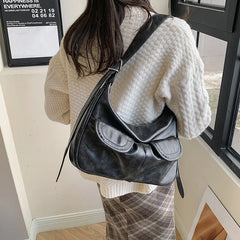 Retro biker-inspired black hobo bag for women