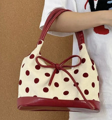 Vintage red polka dot handbag with bow detail