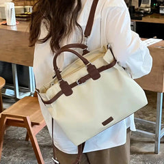Retro style beige travel bag with zipper closure

