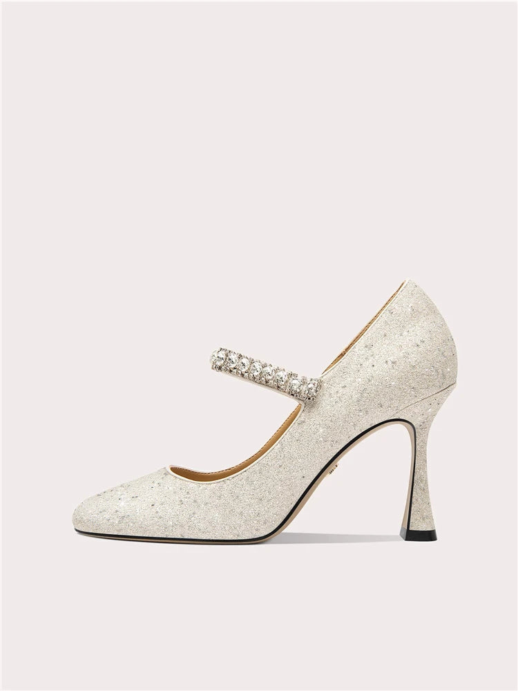 Close-up of rhinestone embellished square toe heels