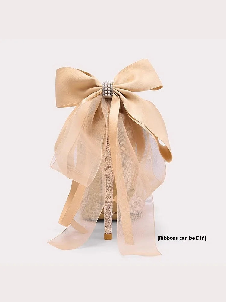 Romantic lace wedding shoes for women with satin bow detail