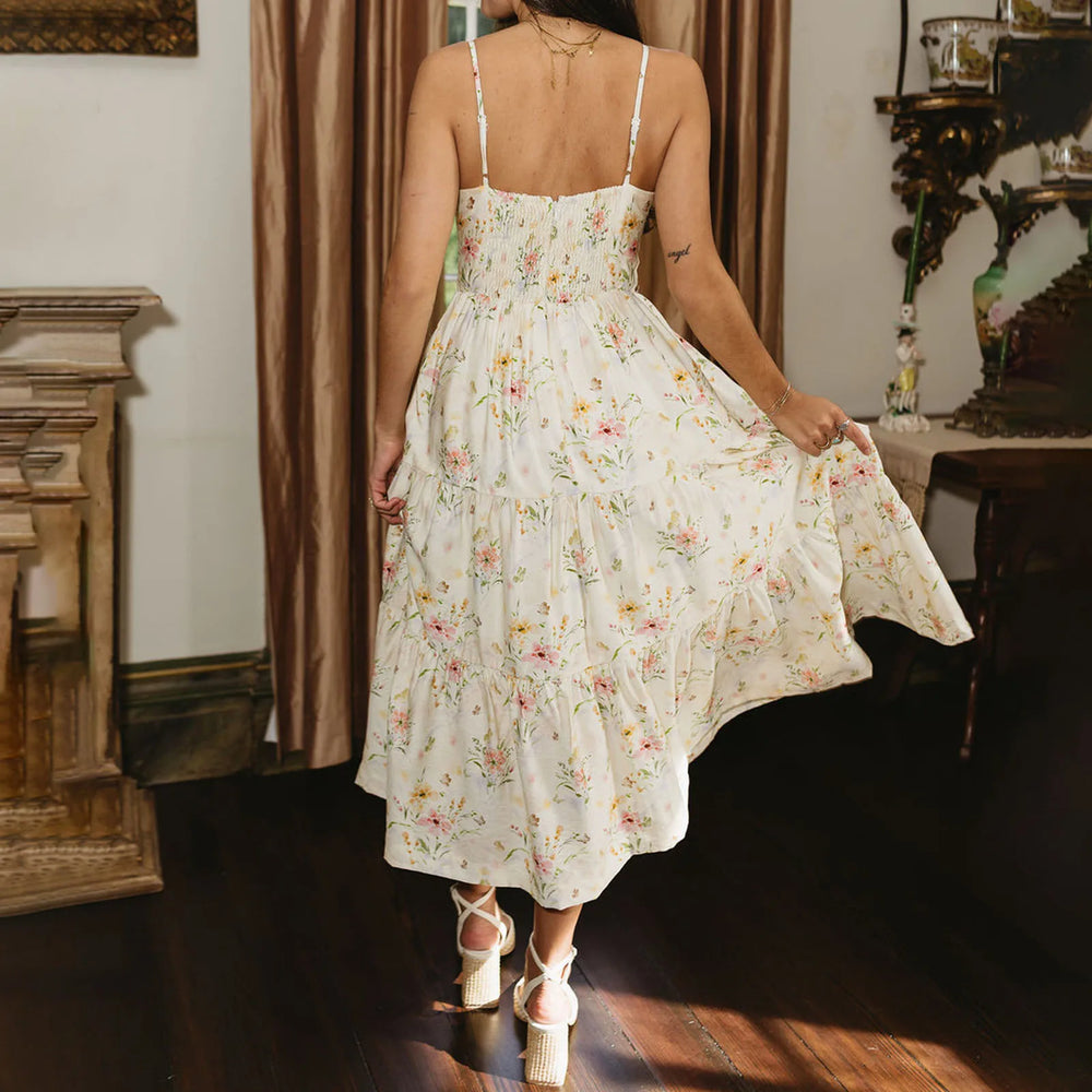 Romantic floral sun dress for wedding guests and travel looks