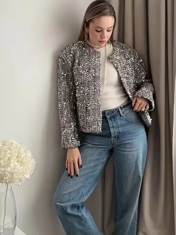 Sparkly embellished jacket styled with denim