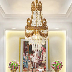 Royal Baroque copper crystal chandelier hanging in a grand entrance