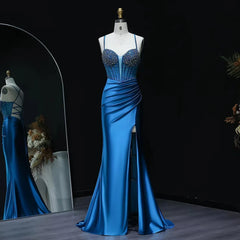 Beaded sweetheart satin mermaid prom gown with side slit on mannequin