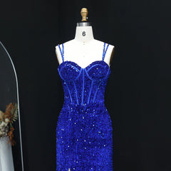 Royal blue sequin mermaid evening gown with a slit and a sweep train