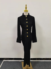 A close-up of the ruched and draped detail on the dress.