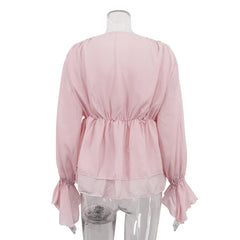 Close-up of ruched bodice and mesh fabric texture on pink blouse mannequin against a white background