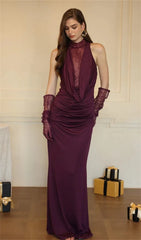 Full-length outfit showing soft ruching and draped shaping through the hips, creating a streamlined floor-length finish.