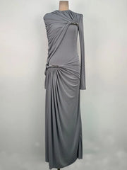 Detail of the ruched hip and waist shaping, creating flattering contour and elegant texture along the slim, elongated silhouette.