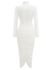 Back view revealing the fitted construction and subtle ruching through the skirt