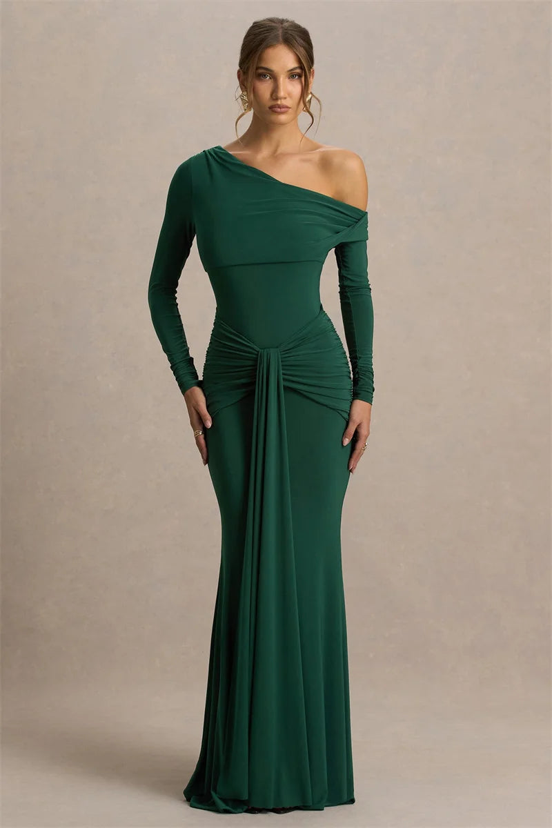 Detail of the ruched waist drape falling into a floor-length skirt, highlighting flattering gathers and a slim, elongated line.