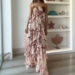 The full length of the ruffle and pleated maxi dress, showing its flowing silhouette.