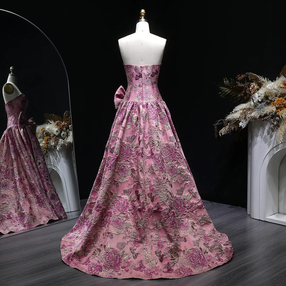 A-line formal dress with draped waist and bow accent