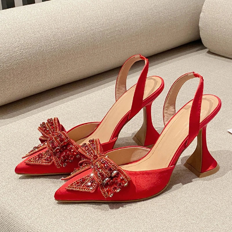 “Party-ready red heels styled for formal evening dress”