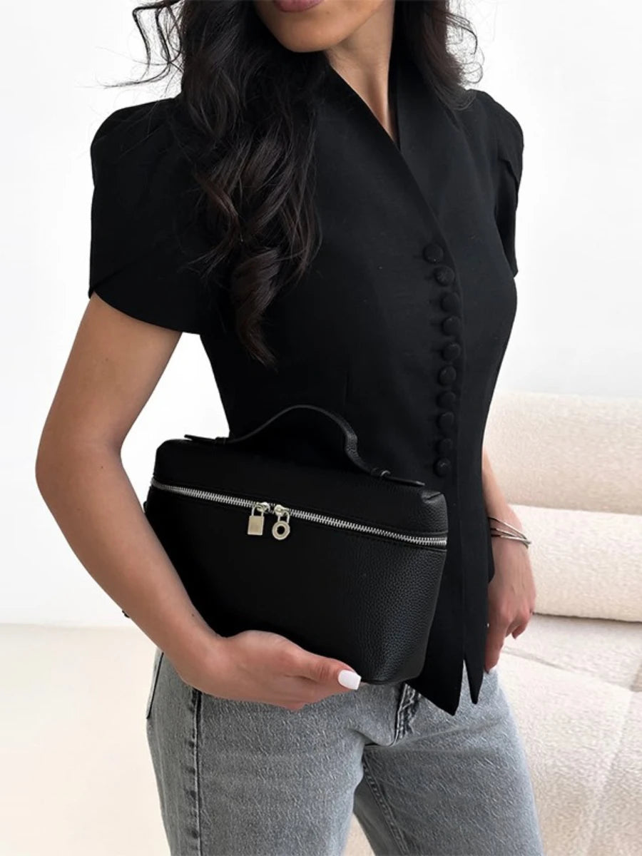 Sculpted v-neck black shirt for streamlined autumn layering and everyday style
