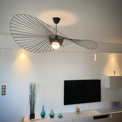  Modern LED Pendant Chandelier, a fusion of minimalist design and sculptural artistry. Its unique fan-like silhouette and fluid form bring elegance t the living room set up.