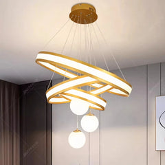Sculptural three ring pendant with white globes in a contemporary home
