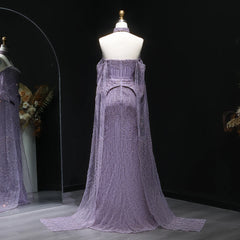 A close-up of the sequin-embellished tulle gown, showing the intricate detail.