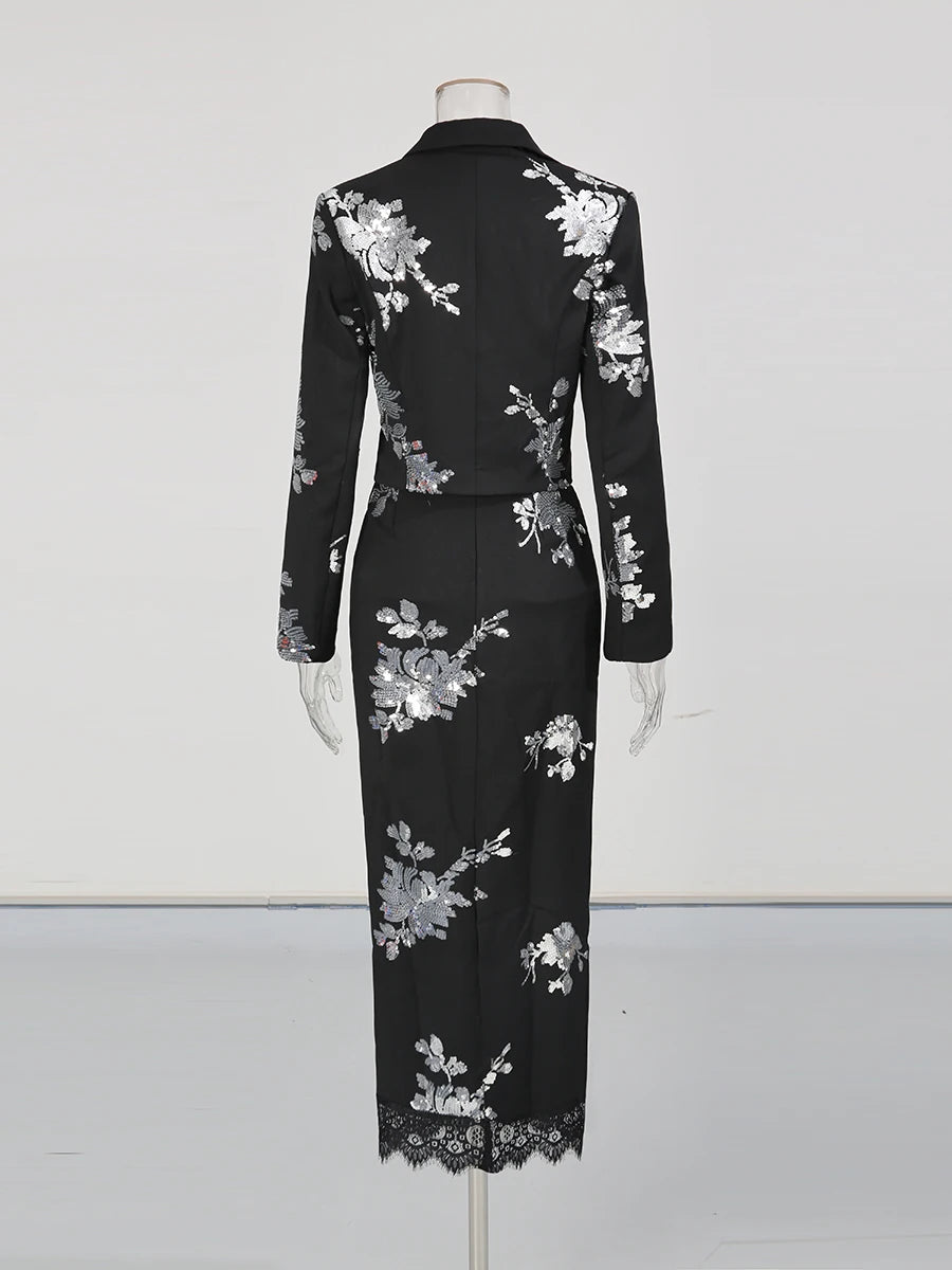 Back view of the black high-waist skirt showing the slim sheath fit and smooth fabric drape.