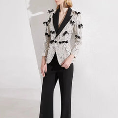 Two-piece silver sequin tailored set for evening wear