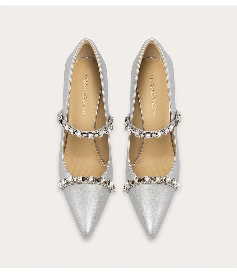 Shallow pointed toe pumps with rhinestone belt strap