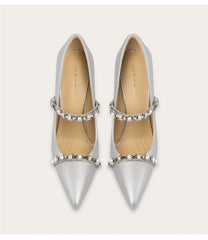 Shallow pointed toe pumps with rhinestone belt strap
