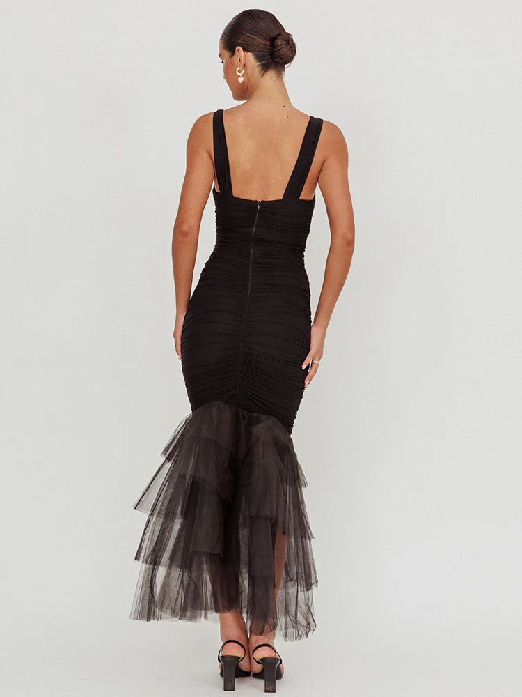 Sheer hem party dress with modern style and dramatic shape