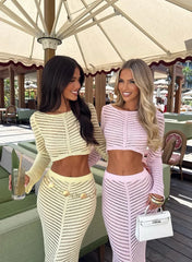 Close-up of sheer knit stripe texture and drape on coordinated top and skirt