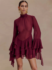 Sheer mesh mini dress with high neckline and tiered ruffle skirt