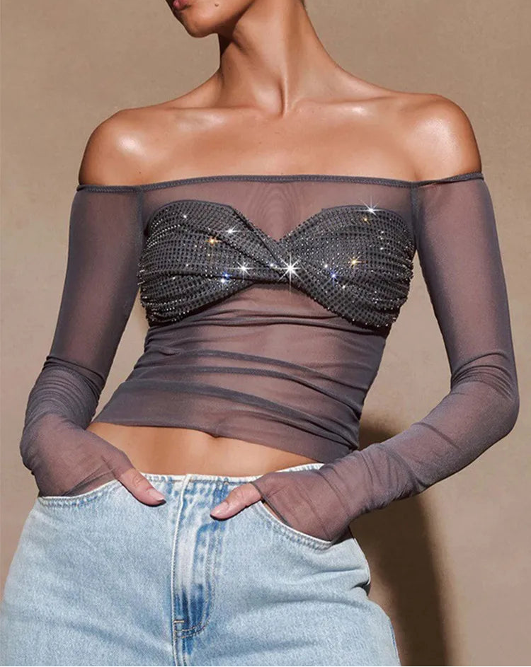 Sheer rhinestone mesh top styled for night out and layering