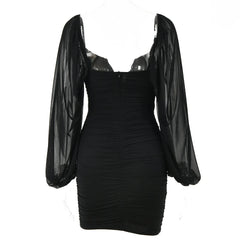 Sheer sleeve black jersey mini dress for modern event looks

