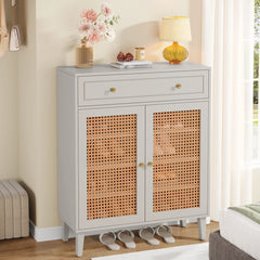 “Modern light gray shoe organizer with storage drawers and plants”

