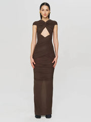 Woman wearing a hort sleeve slim evening party dress in brown shown for events on a white background