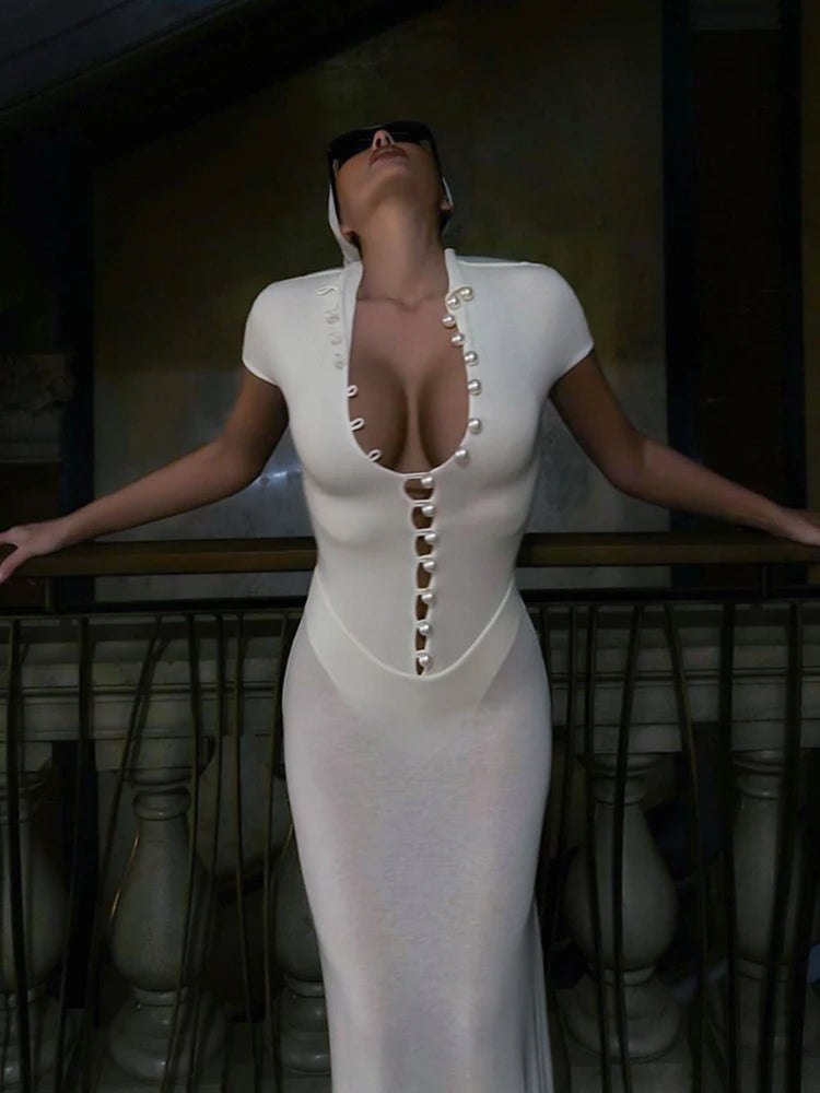 Short sleeve turtleneck evening dress styled with minimal accessories