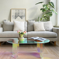 “Side view of lightweight modern acrylic coffee table with vibrant sheen”

