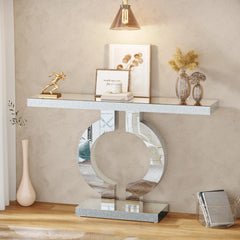“Side view showing sculptural base and slim console profile”

