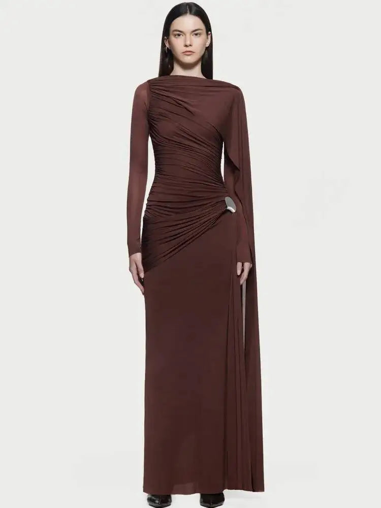 Asymmetrical drape detail on an elegant floor-length style evening gown