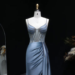 Formal mermaid gown featuring embellished bodice panels and smooth satin finish