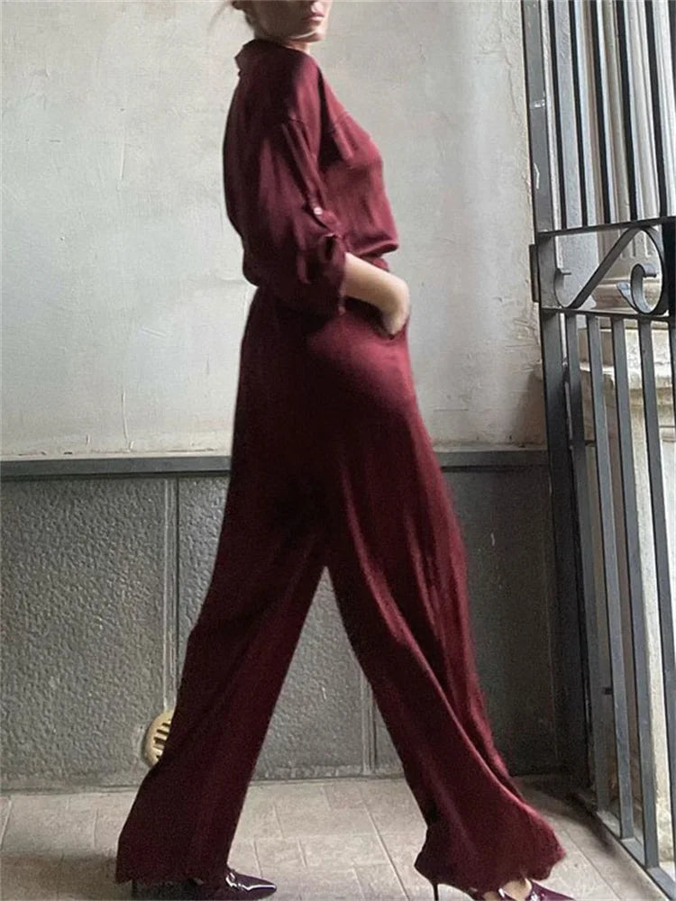 Side view of relaxed satin jumpsuit showing flow and fit