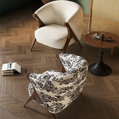 “Side view of Italian-style reading chair and accent table set”

