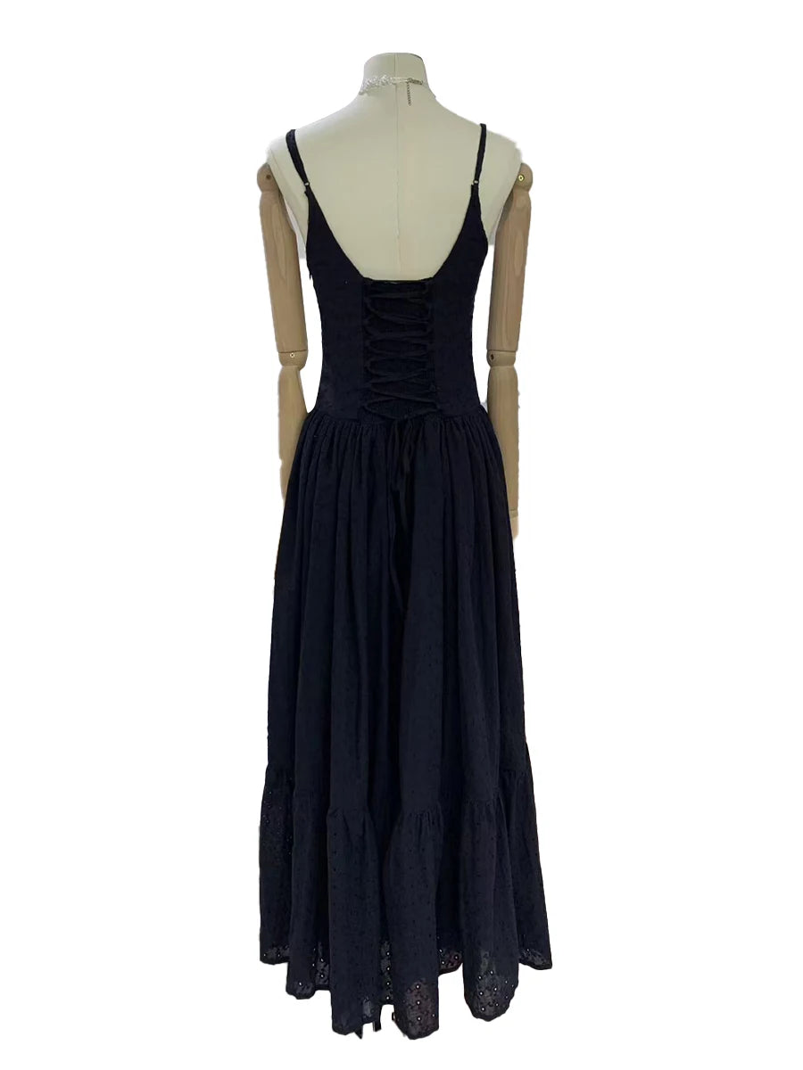 “Side profile of sleeveless patchwork mesh dress with spaghetti straps”

