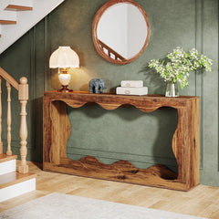 side angle view of console table styled in entry hallway

