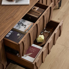 “Side view of minimalist TV console with matte wood finish and storage”