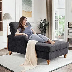 side profile of reclined white chaise lounge in bright living room

