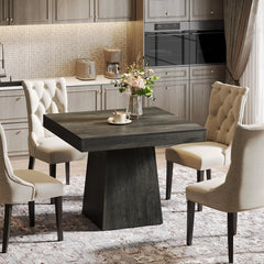 side view of 31 inch dining table styled in cozy kitchen corner

