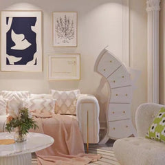 “Side profile of luxury minimalist couch in modern living room setup”