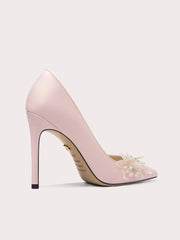 Close-up of silk pearl lace flower pointed toe heels