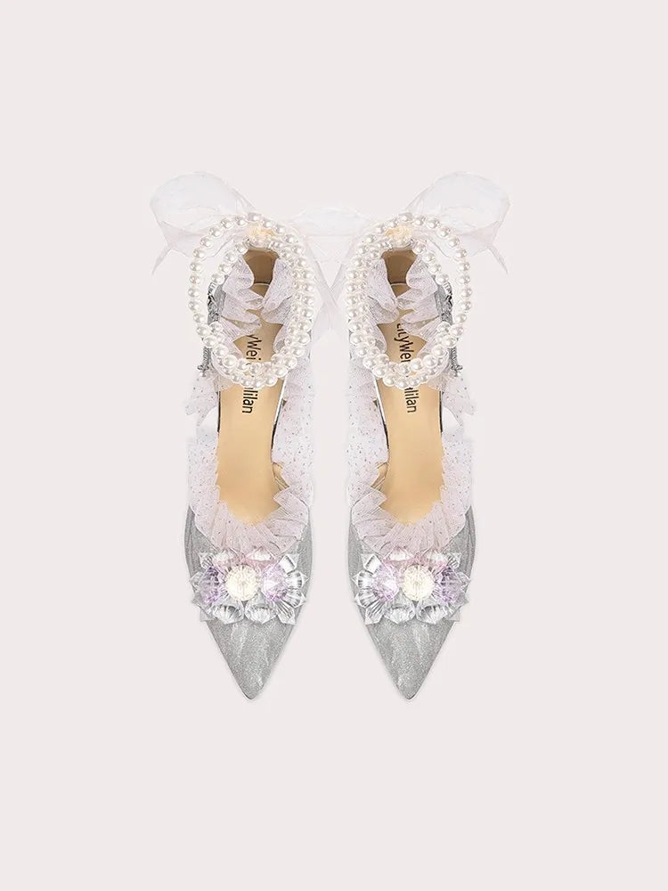 Silver floral bow party sandals styled for weddings and celebrations