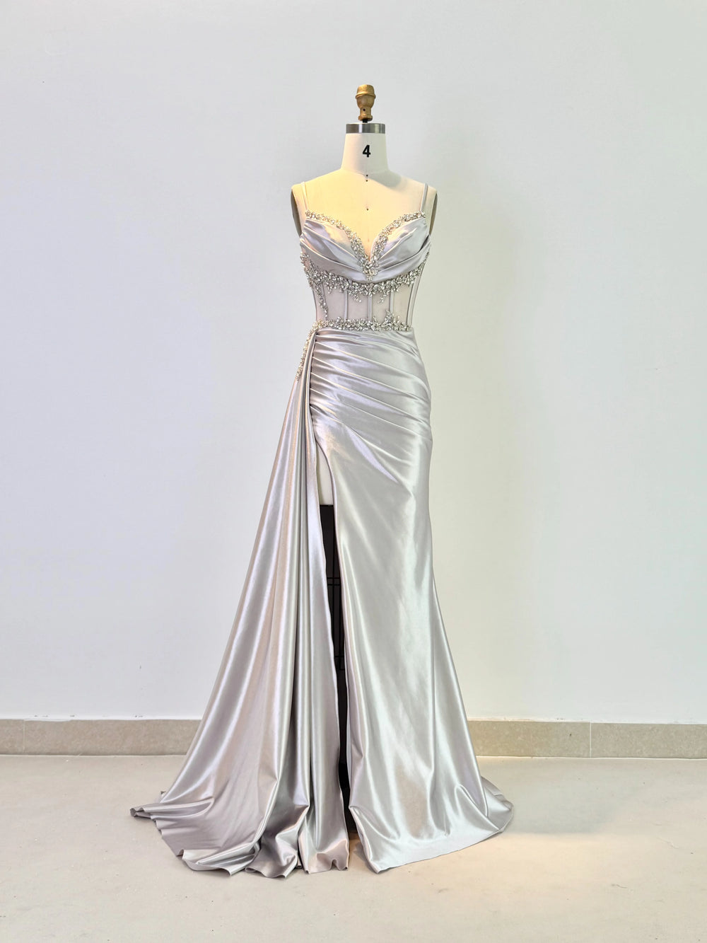 Mermaid satin prom gown with V-neckline and crystal bodice detail